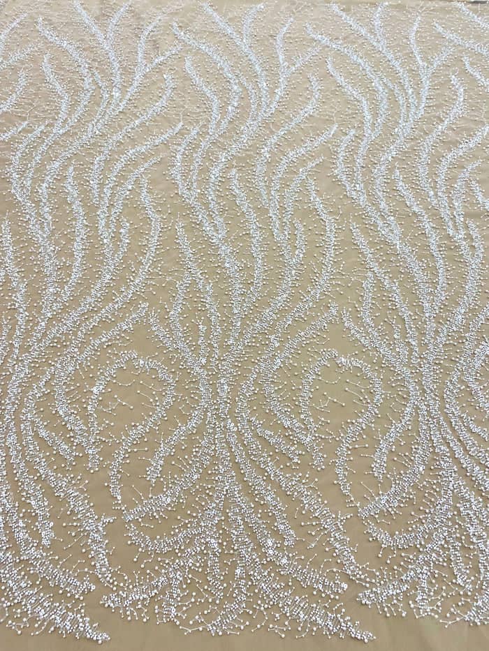 Ivory couture lace with pearls, beads and sequins