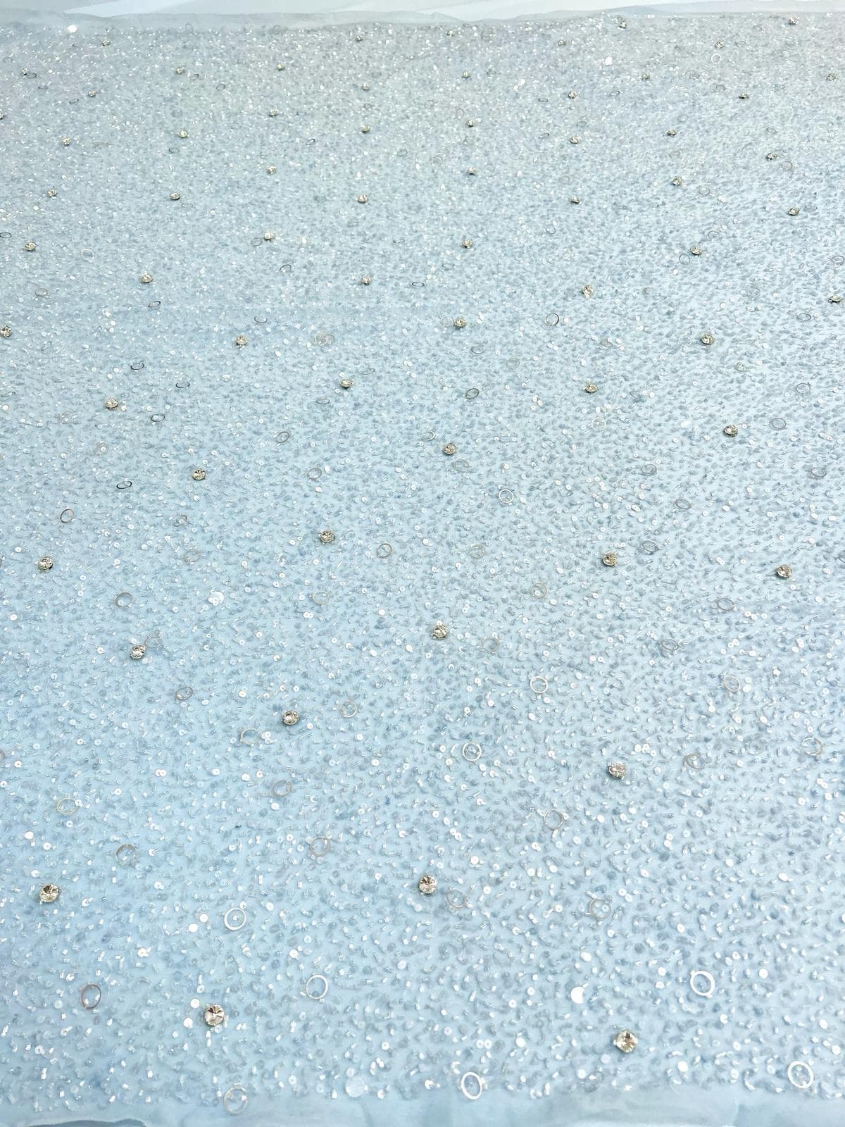 Baby-blue haute-couture lace, beaded