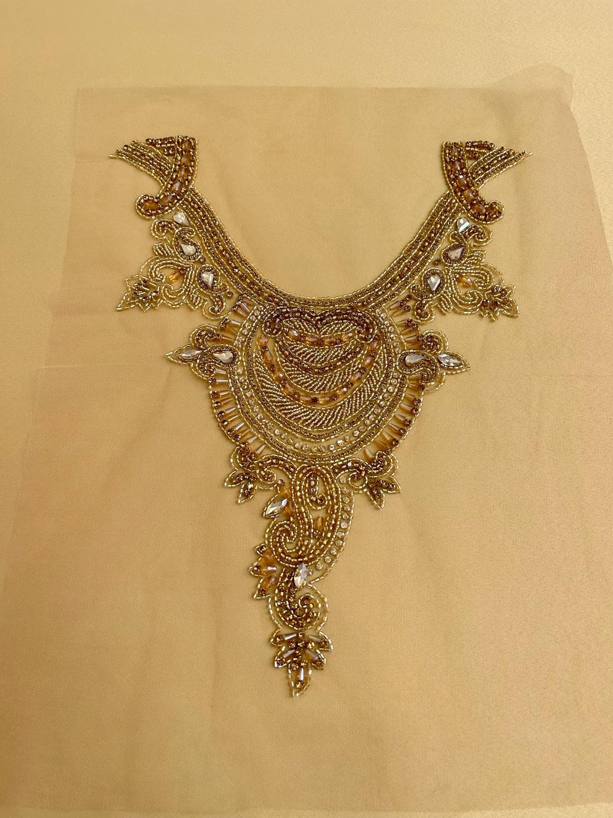 Antique-gold haute-couture panel, beaded