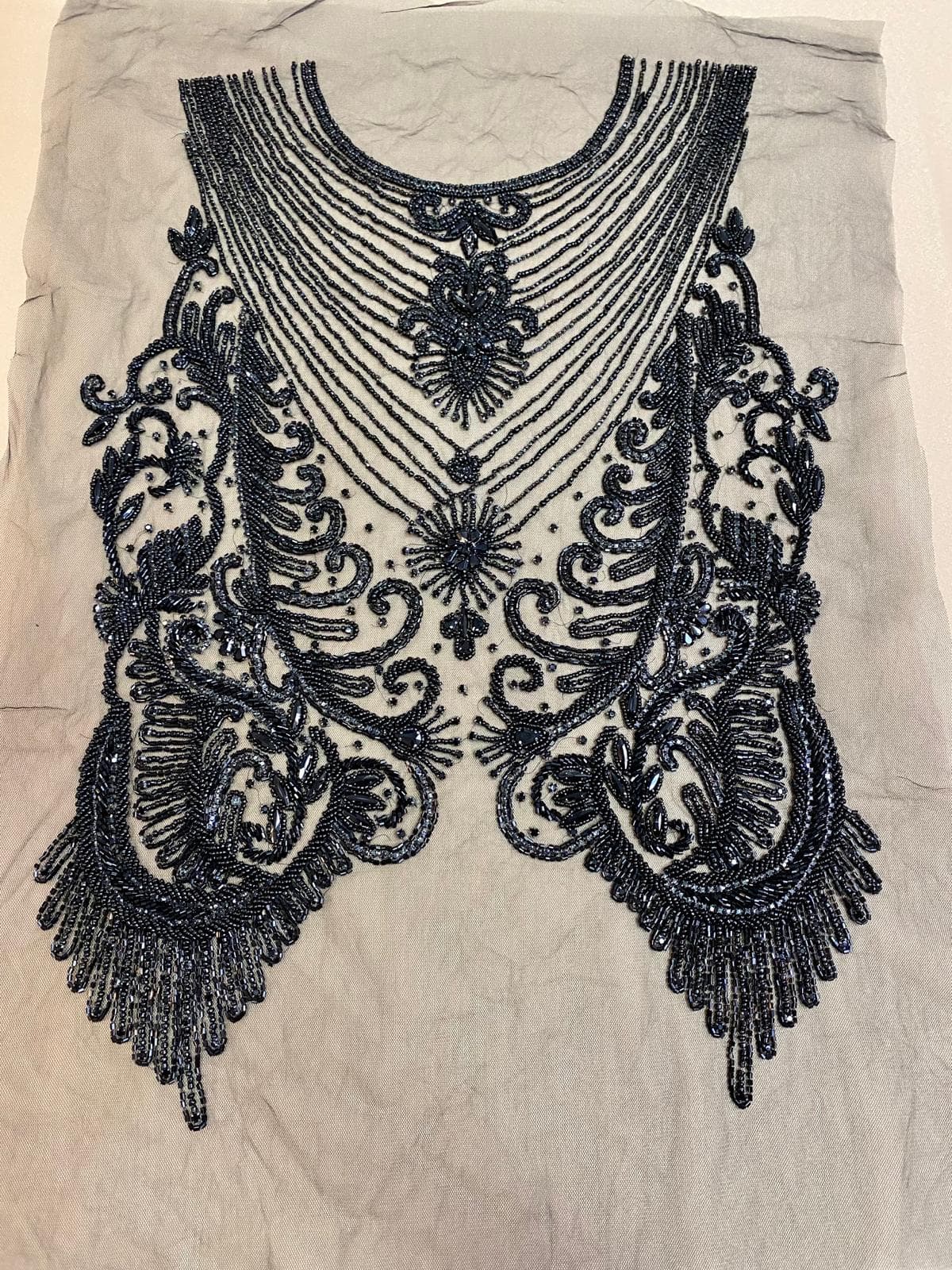 Black haute-couture panel, beaded
