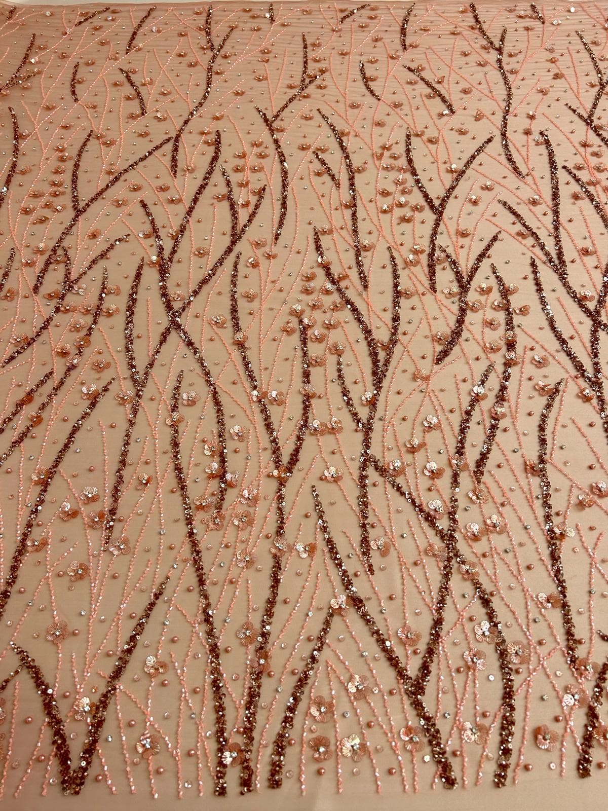 Rose-gold haute-couture lace, beaded
