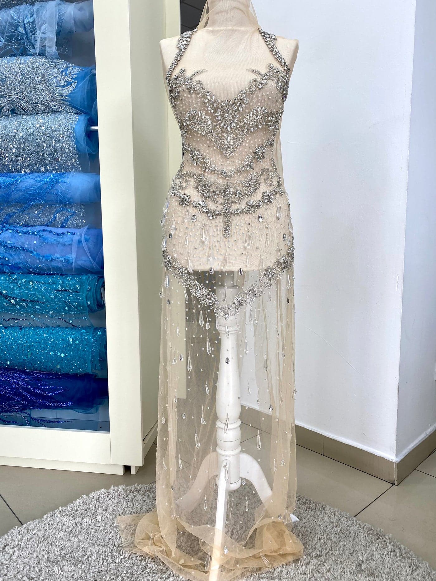 Silver haute-couture front-and-back panel set with crystals and fringe