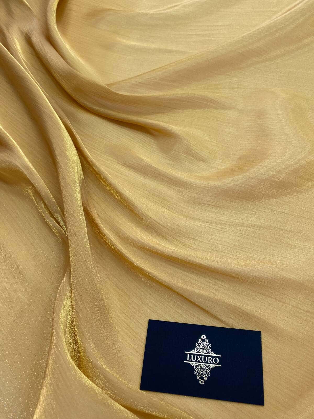 Gold metallic crinkle voile, softly draped