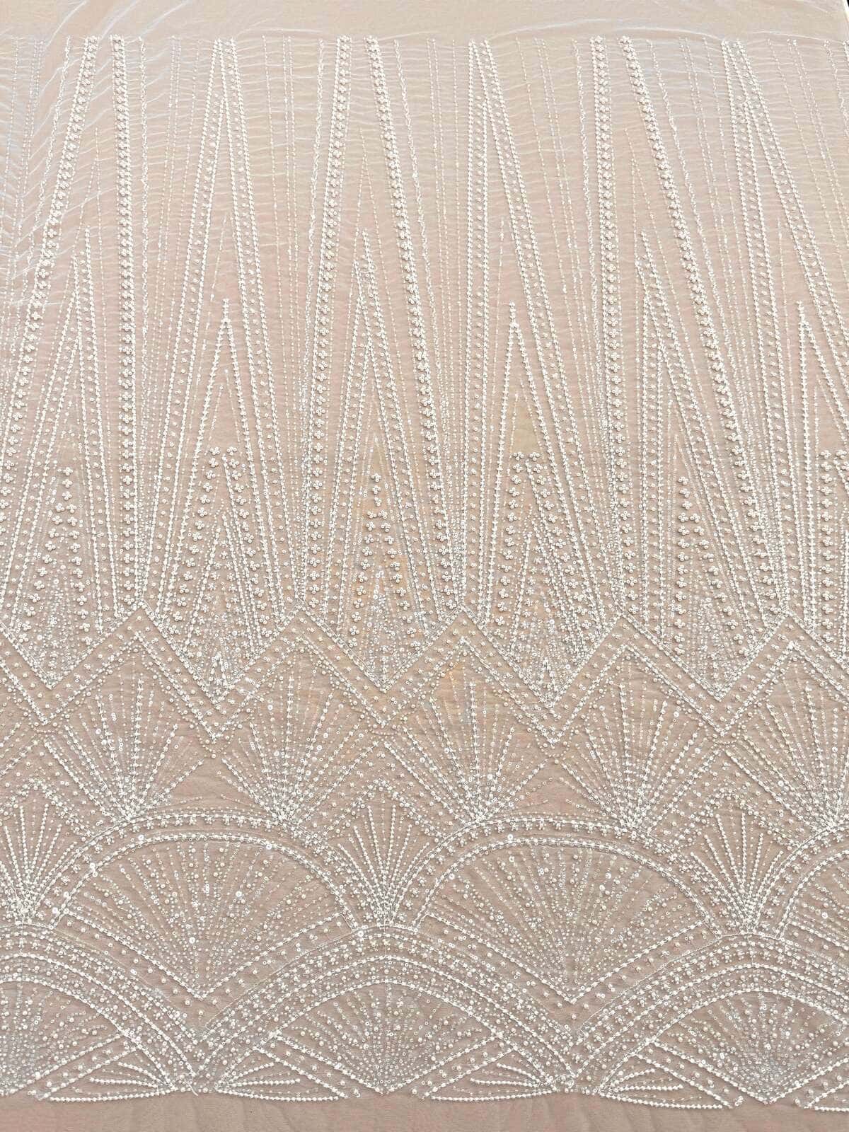 Ivory couture lace with geometric beaded pattern
