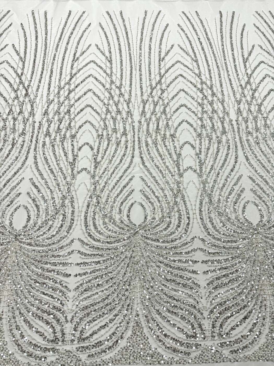 Silver panelled couture lace with plume motifs on ivory tulle