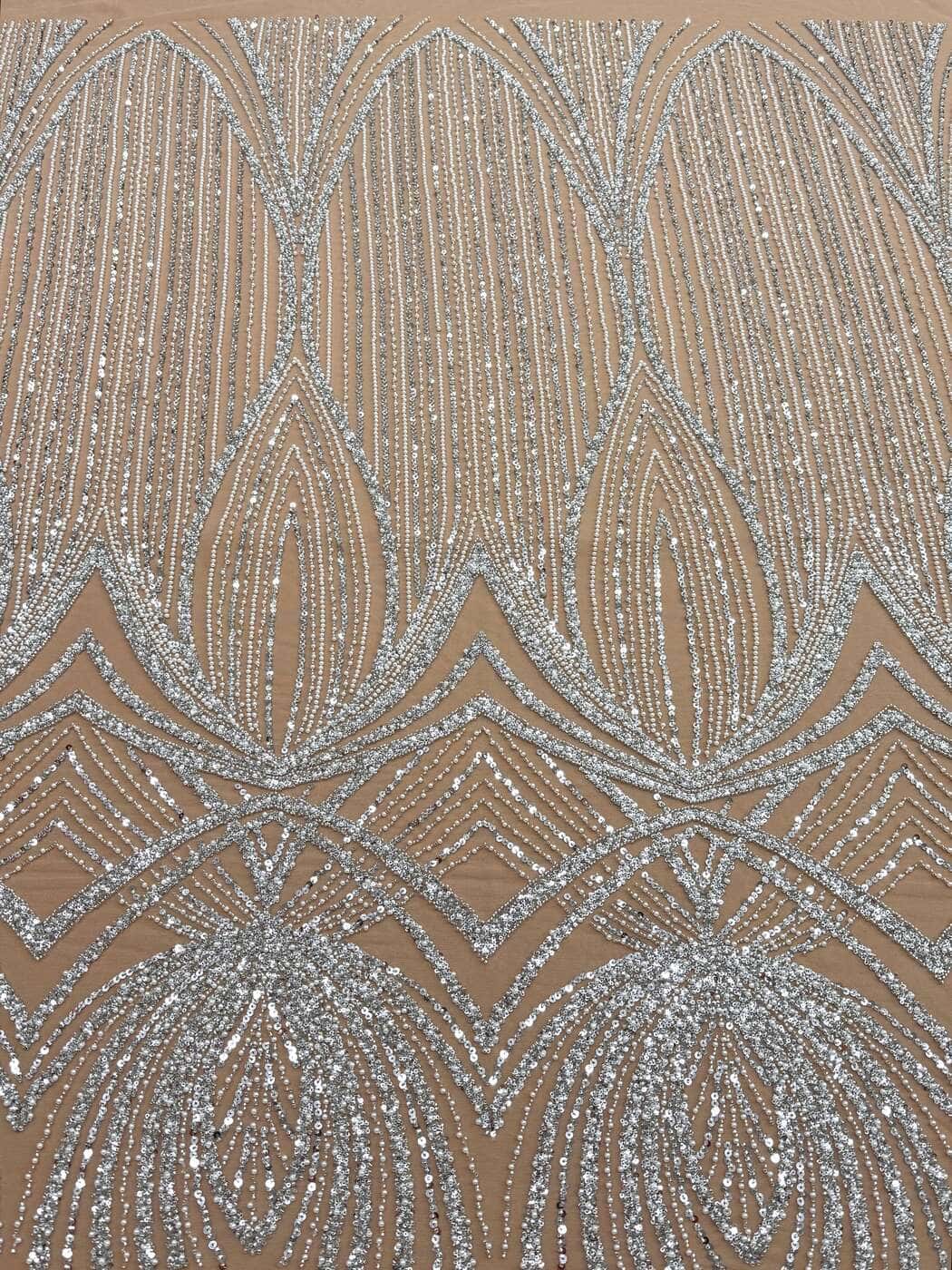 Silver couture lace with geometric beadwork on nude tulle