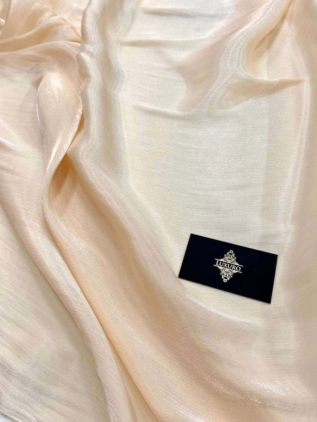 Nude coated crêpon voile with a soft sheen